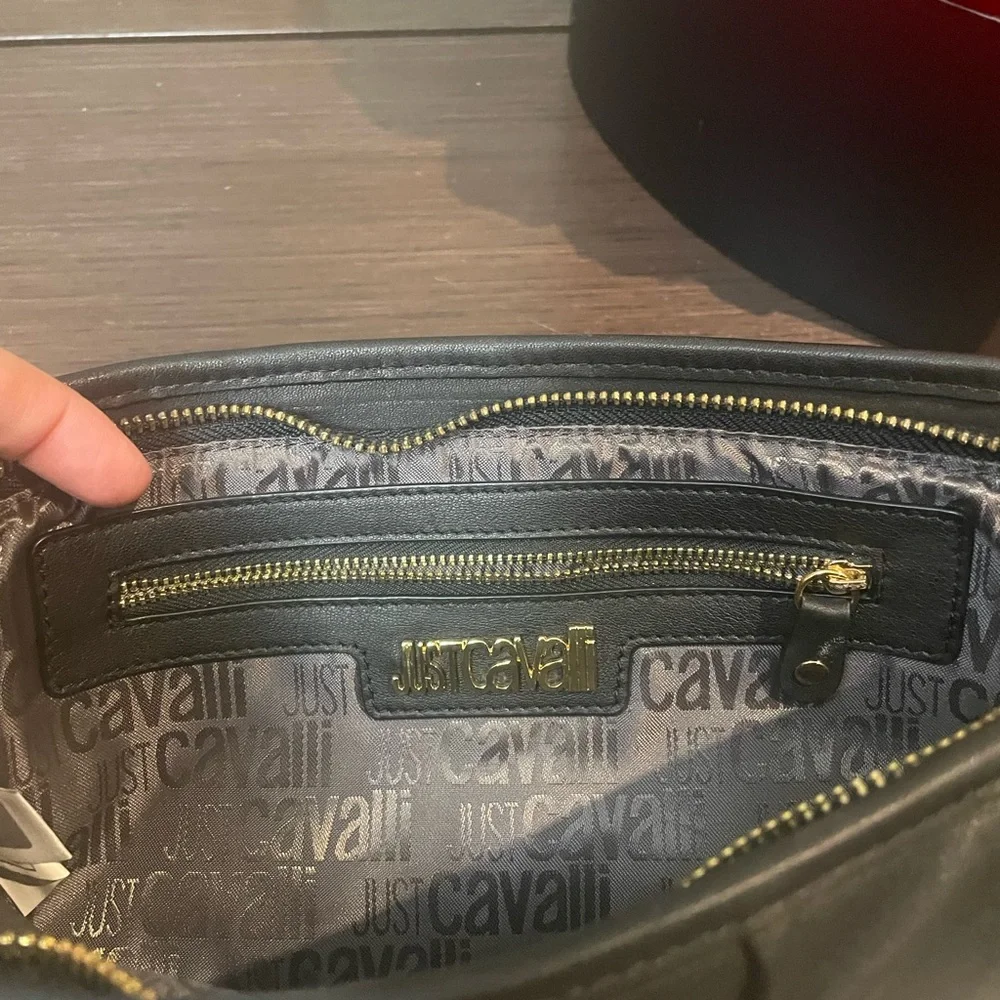Roberto Cavalli - Just Cavalli Black leather ruffle, clutch with gold grommet
